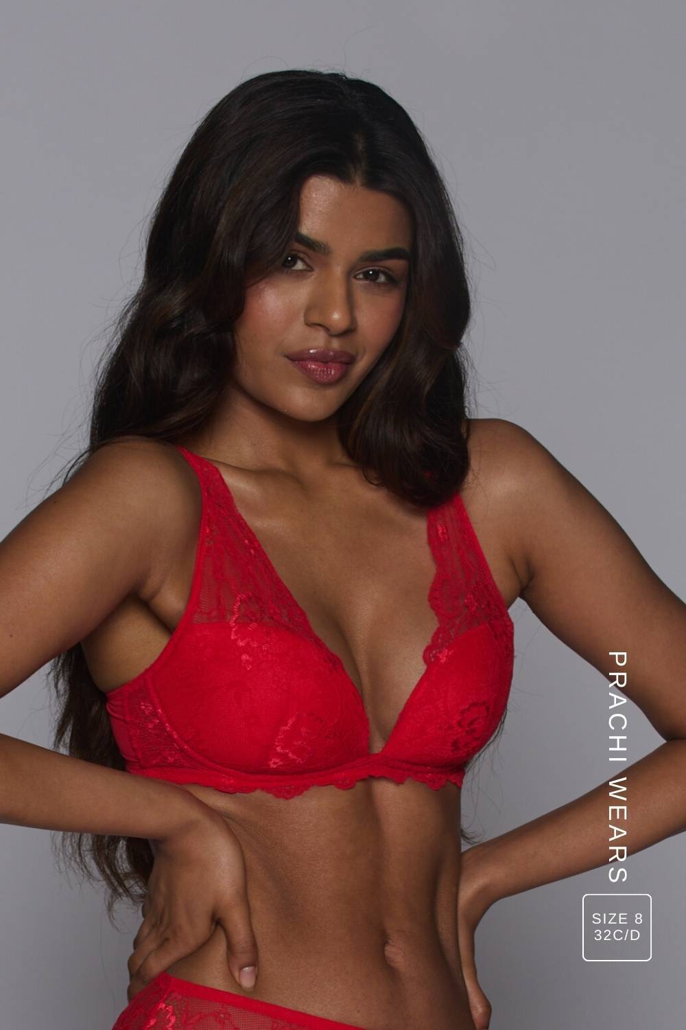 A woman wearing a red lace push up bra ^Prachi | Size: 32 C-D / 8
