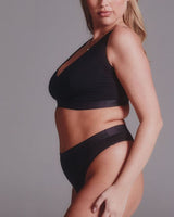 A woman wearing a balck modal thong ^Ayisha | Size: 34 E / 12
