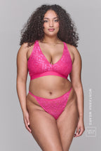 A woman wearing a pink lace fuller cup bralette paired with matching knickers ^Montanna | Size: 36 FF / 16