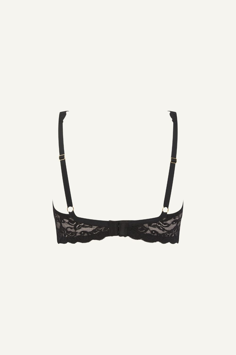 A ghost image of the back of a black silhouette lace bra 