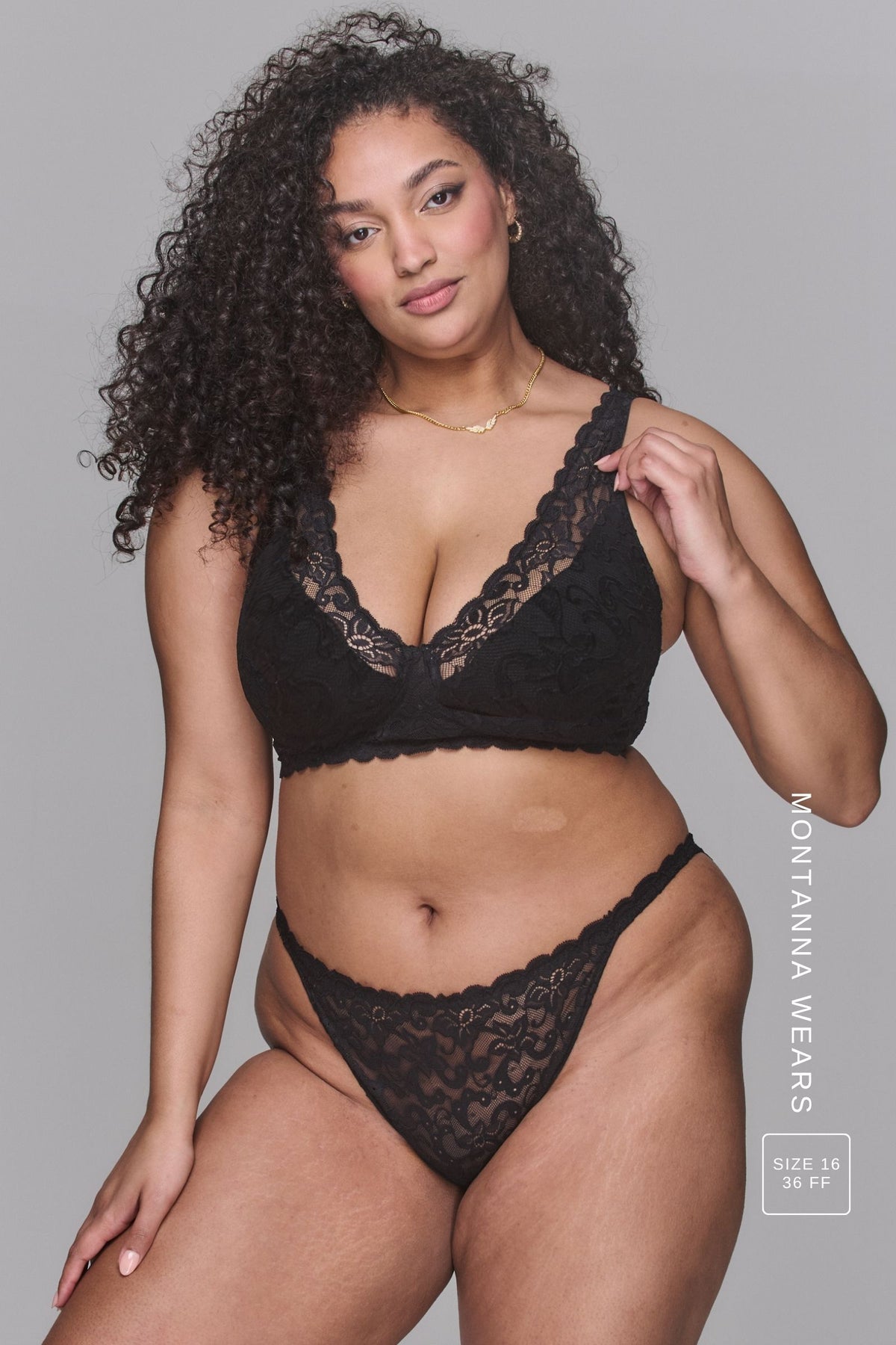 A Woman wearing the Silhouette Lace Tanga Brief in Black paired with the matching bralette ^Montanna | Size: 36 FF/ 16