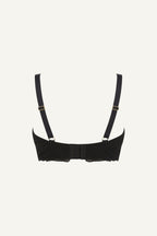 A ghost image of the back of a black fuller cup bra called the flex 
