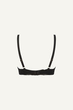 A ghost image of the back of a black bra called the flex 