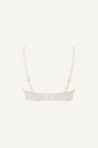 a ghost image of the back of a white bra called the flex 