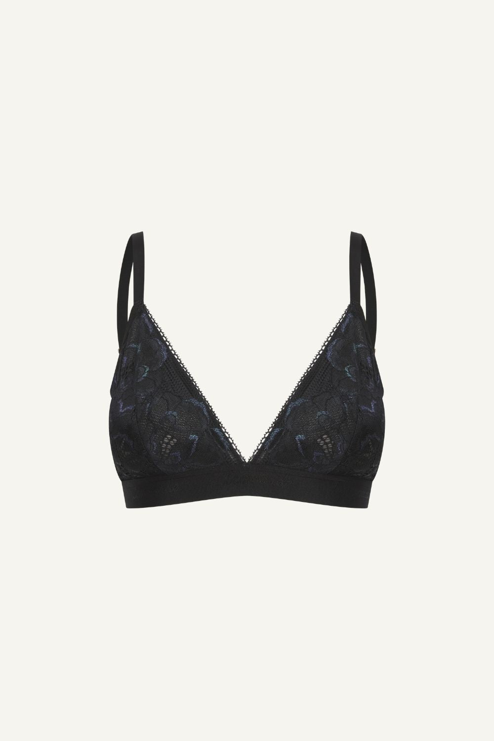 A ghost image of a black lace bralette called "iridescent" 
