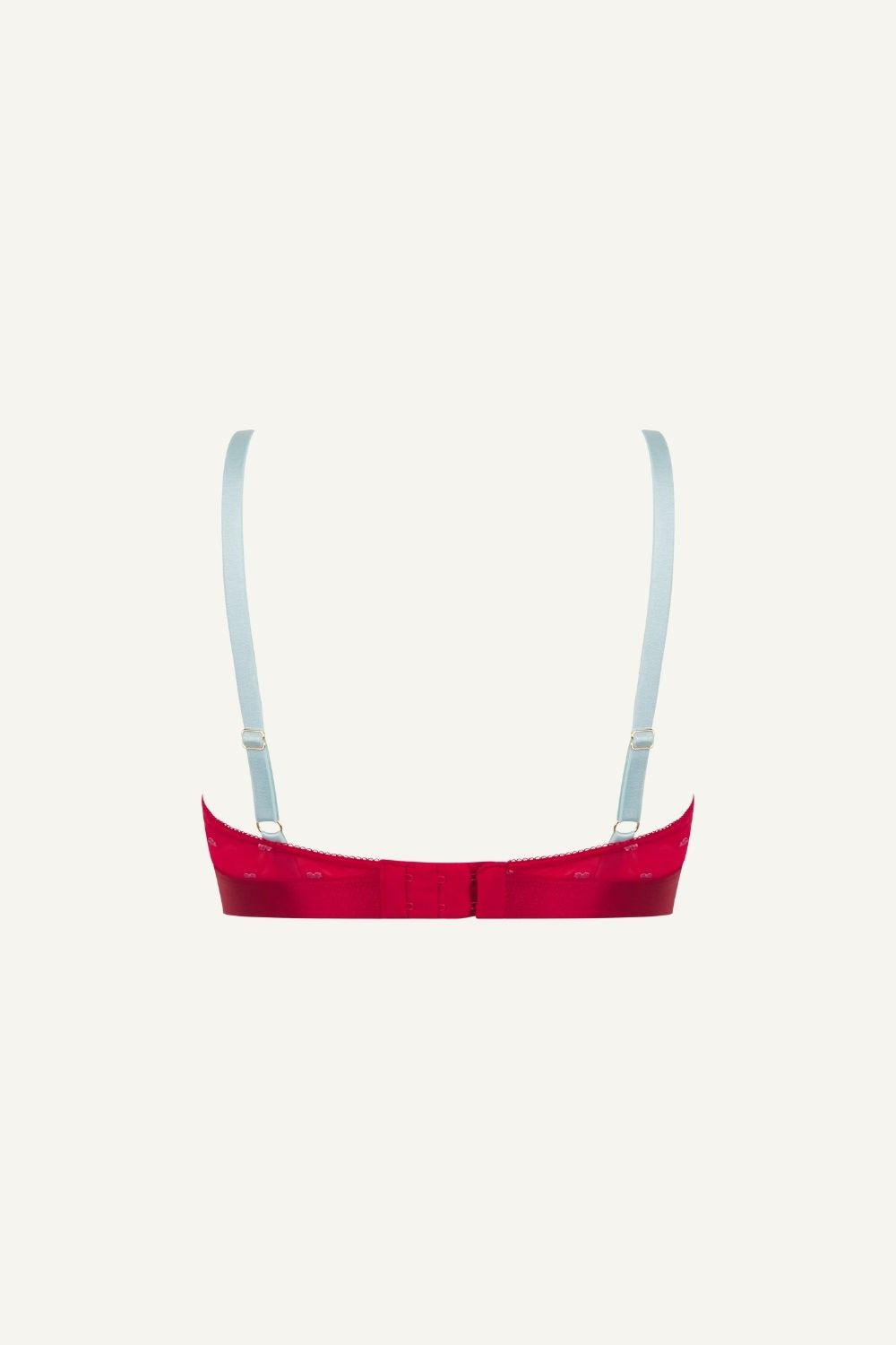 A ghost image of the back of a red mesh bralette with light blue straps 