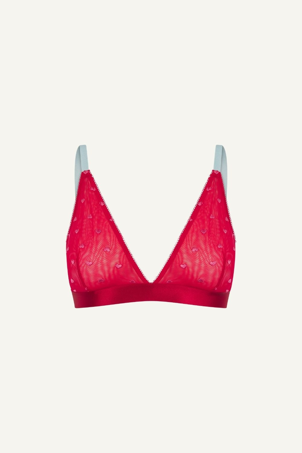 A ghost image of the front of a red mesh bralette with blue straps and small pink hearts on it 