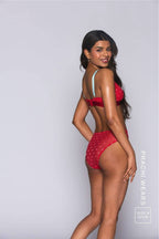 A woman modelling a red mesh bralette with small pink hearts and matching briefs ^Prachi | Size: 32 C-D / 8