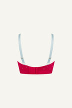 A ghost image of the back of a red mesh fuller cup bralette with small hearts on it 