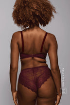 A woman standing with her back turned wearing the Wine Lace Short paired with the matching Wine Lace Push Up Bra ^Kelly | Size: 32 DD / 12
