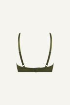 A ghost image of the back of a green mesh bralette 