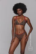 A woman modelling a leopard print lace lingerie set ^Kendra | Size: 32 A-B