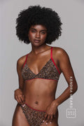 Model wearing a leopard print lingerie with red straps ^Kendra | Size: 32 A-B / 8