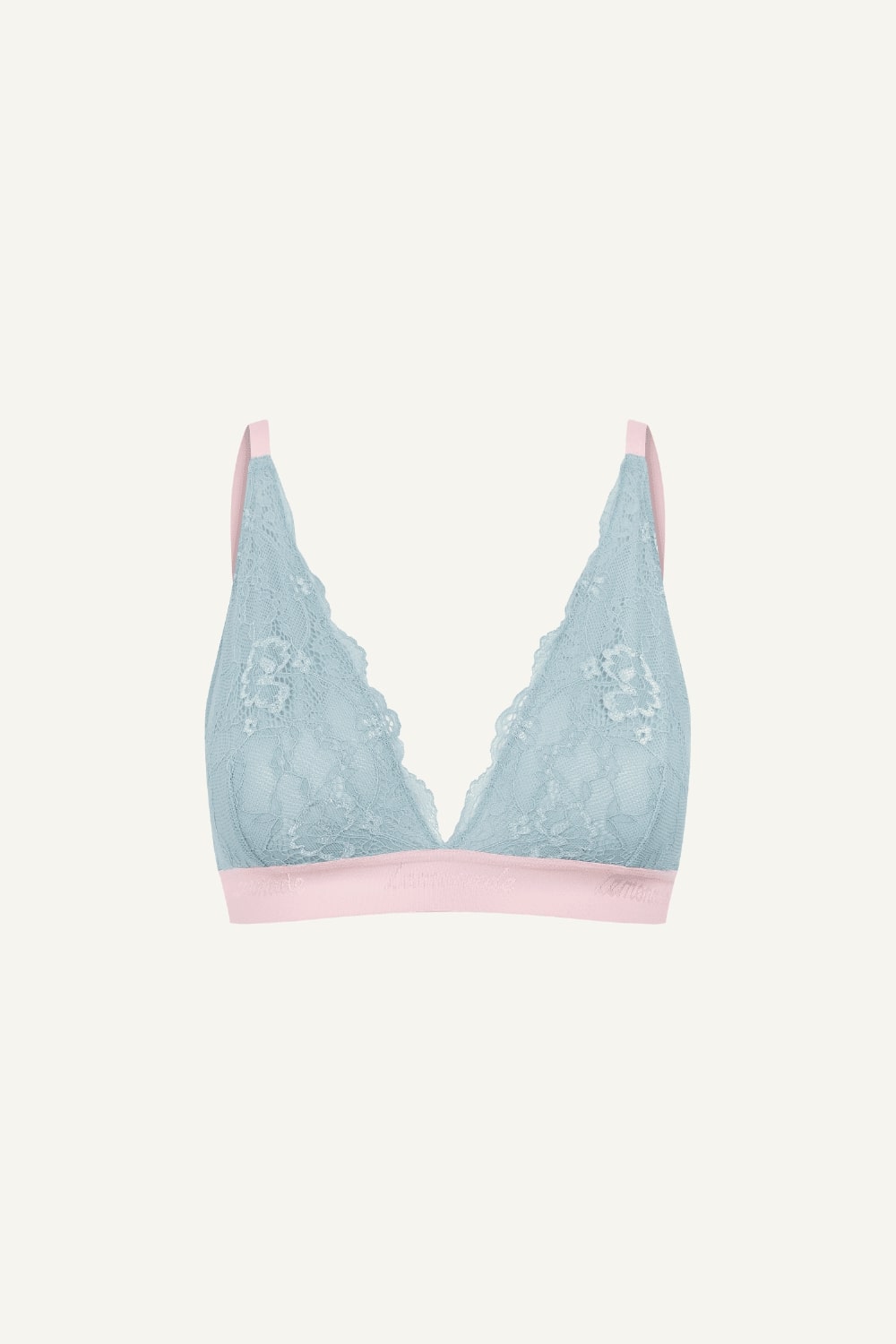 A ghost image of a light blue lace bralette 