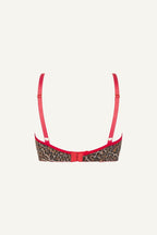 a ghost image of a leopard print lace bralette with red straps 