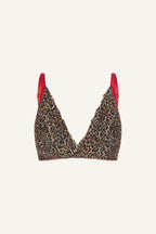 a ghost image of a leopard print lace bralette with red straps 