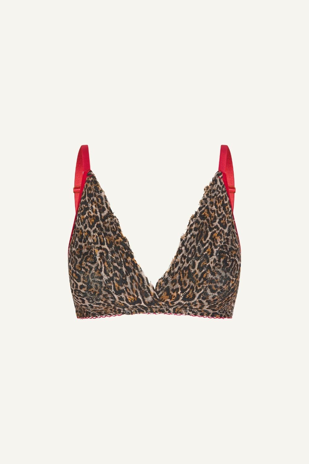 a ghost image of a leopard print lace bralette with red straps 