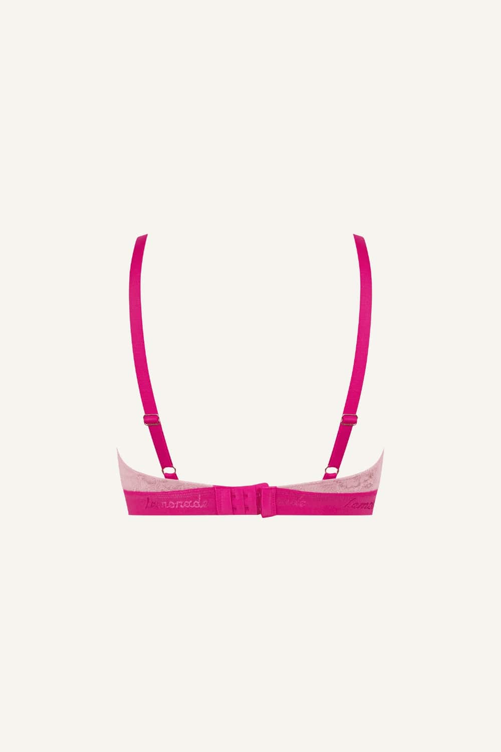 A ghost image of the back of a two toned pink lace bralette 