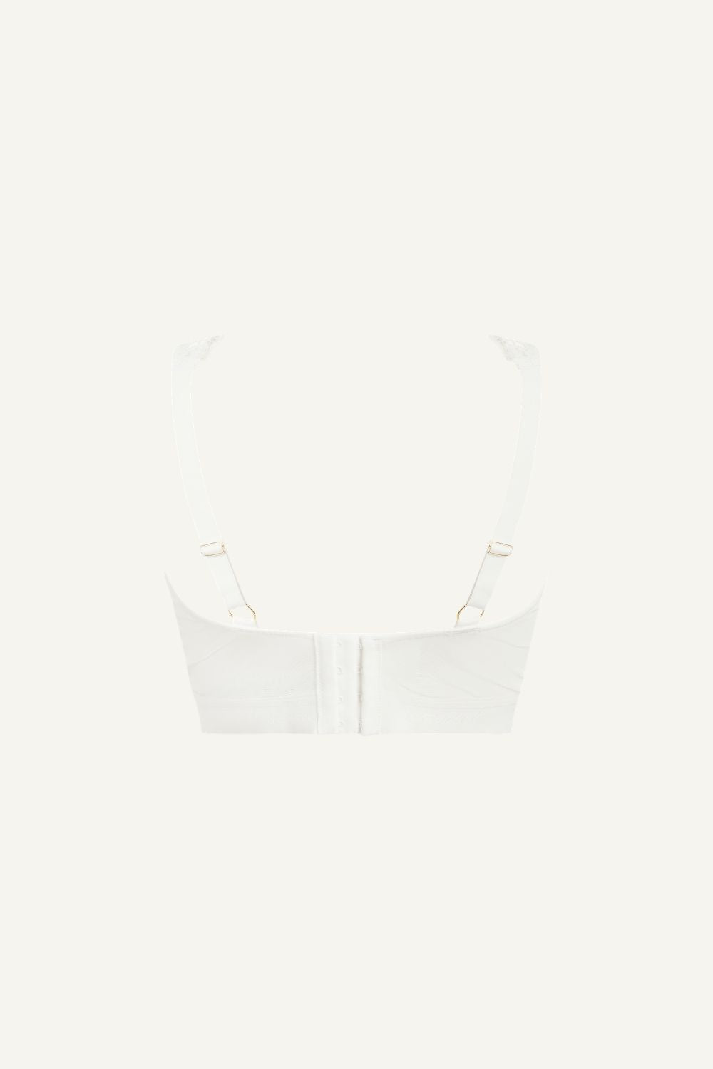 A ghost image of a white lace fuller cup bralette 