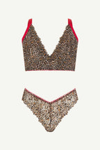 A ghost image of the front of a leopard print mesh matching lingerie set 