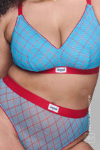 A close up of a woman modelling a blue check print mesh fuller cup bralette paired with a matching brief 