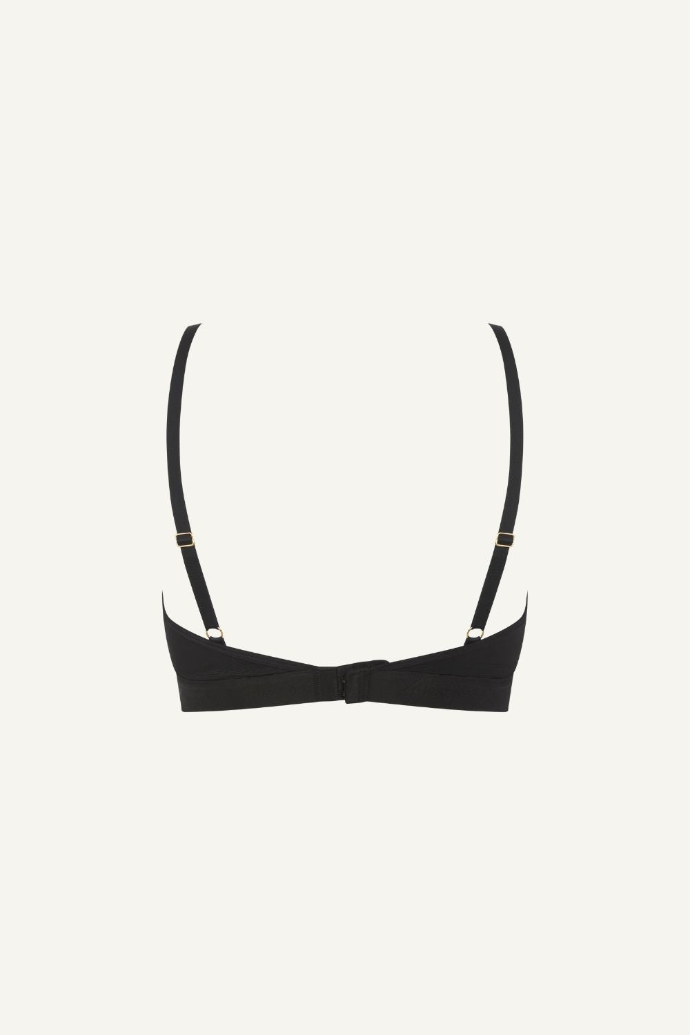 a ghost image of the back of a black lace bralette 