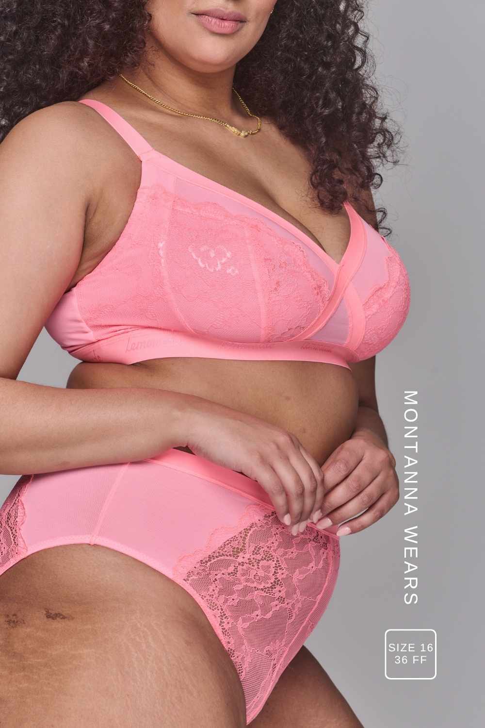Woman wearing a high support coral bra called The One paired with matching knickers ^Montanna | Size: 36 FF/ 16