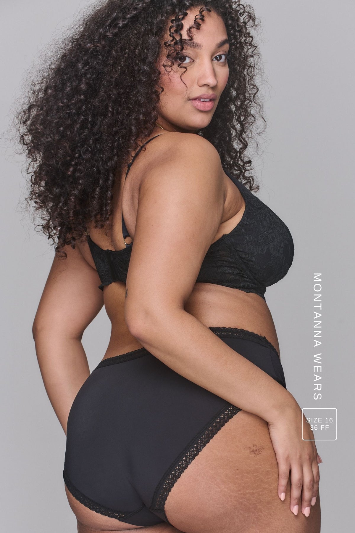 A woman wearing a black pair of briefs called "The Flex" paired with the matching bra ^Montanna | Size: 36 FF/ 16
