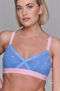 A woman wearing a pink and blue lace bra called The One 