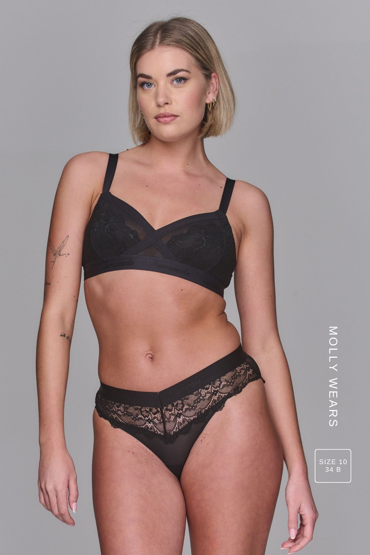 A woman modelling The One Signature Lace Black Bra, paired with a matching black brief ^Molly | Size: 34 B  / 10