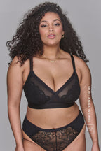 A woman modelling a Black Lace High Waist Brief paired with a matching black bra ^Montanna | Size: 36 FF / 16