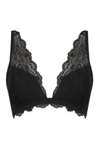 A ghost image of a black lace push up bra 