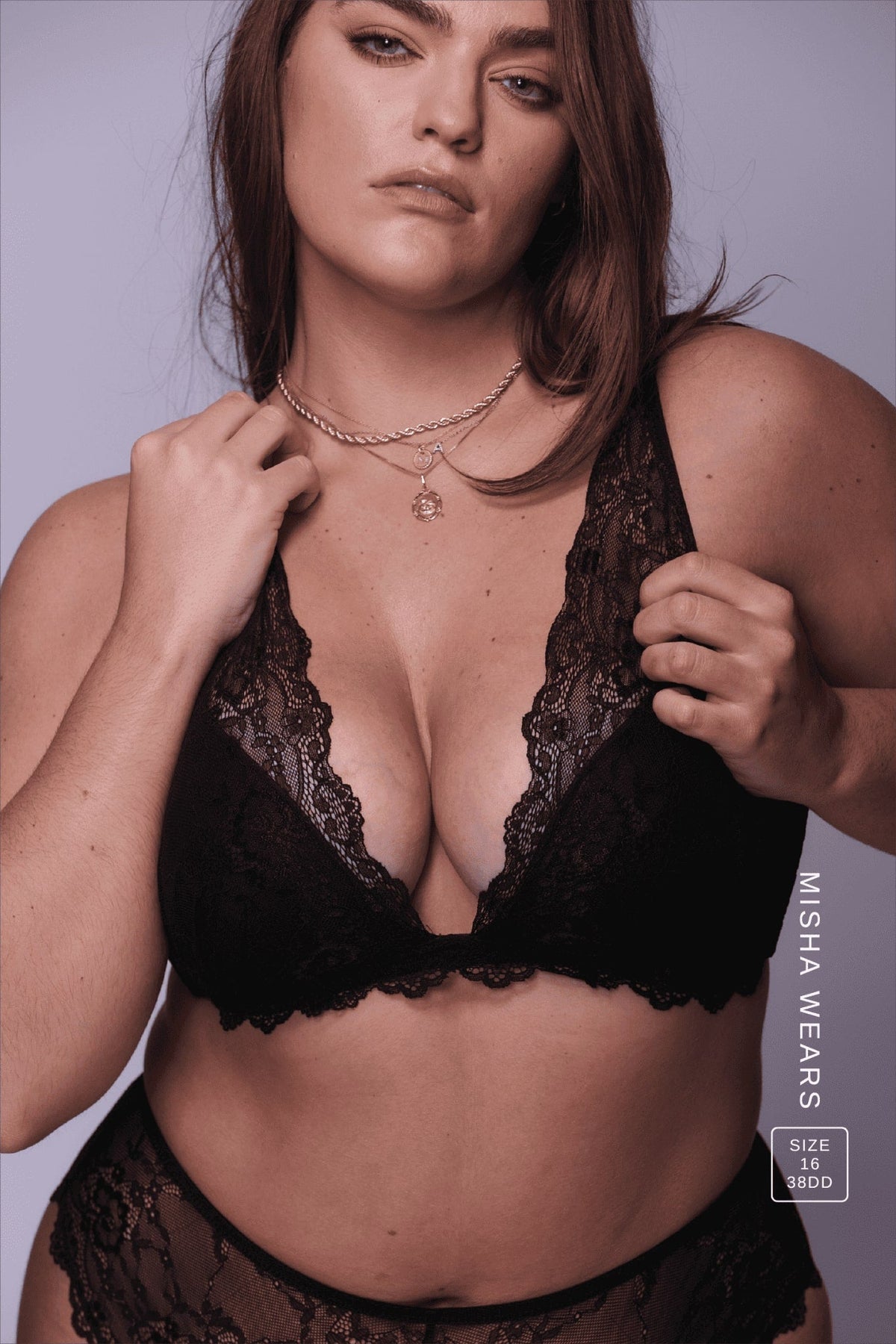A woman wearing a black lace lingerie set ^Misha | Size: 38 DD / 18