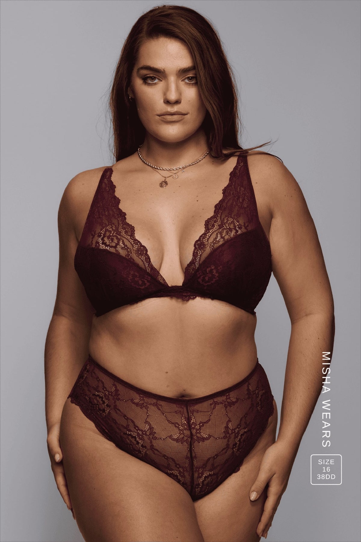A woman wearing a wine lace push up paired with a matching short ^Misha | Size: 38 DD / 18