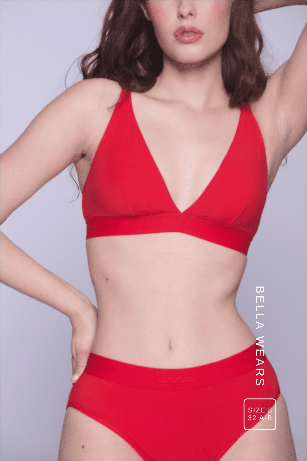 A close up image of a woman wearing a matching red mesh lingerie set ^Bella | Size: 32 A-B / 8