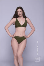 A woman wearing a khaki green bralette paired with the matching khaki green thong ^Bella | Size: 32 A-B / 8