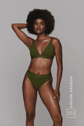 A woman wearing a khaki green lingerie set ^Kendra | Size: 32 A-B / 8
