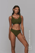 A woman wearing a khaki green fuller cup  bralette paired with a matching khaki green brief  ^Kayleigh | Size: 30 FF / 8