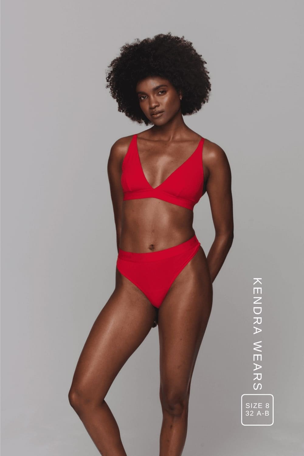 A woman wearing a red mesh thong paired with a red mesh bralette ^Kendra | Size: 32 A-B / 8