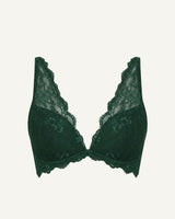 A ghost image of the front of a green lace push up bra 