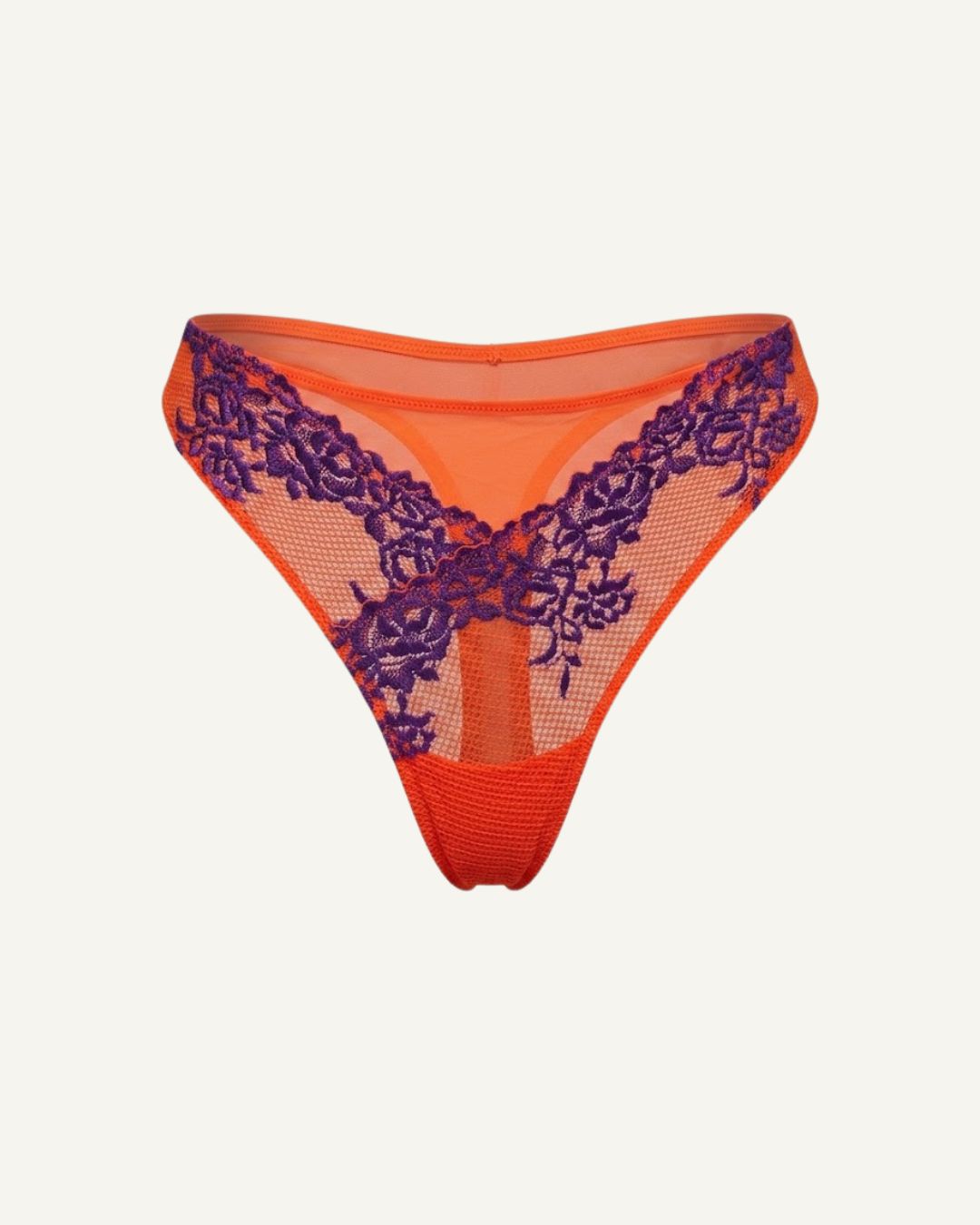 a ghost image of the front of a orange and purple embroidered lace thong 