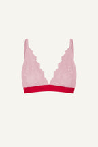 A ghost image of the front of a light pink bralette with a red band 