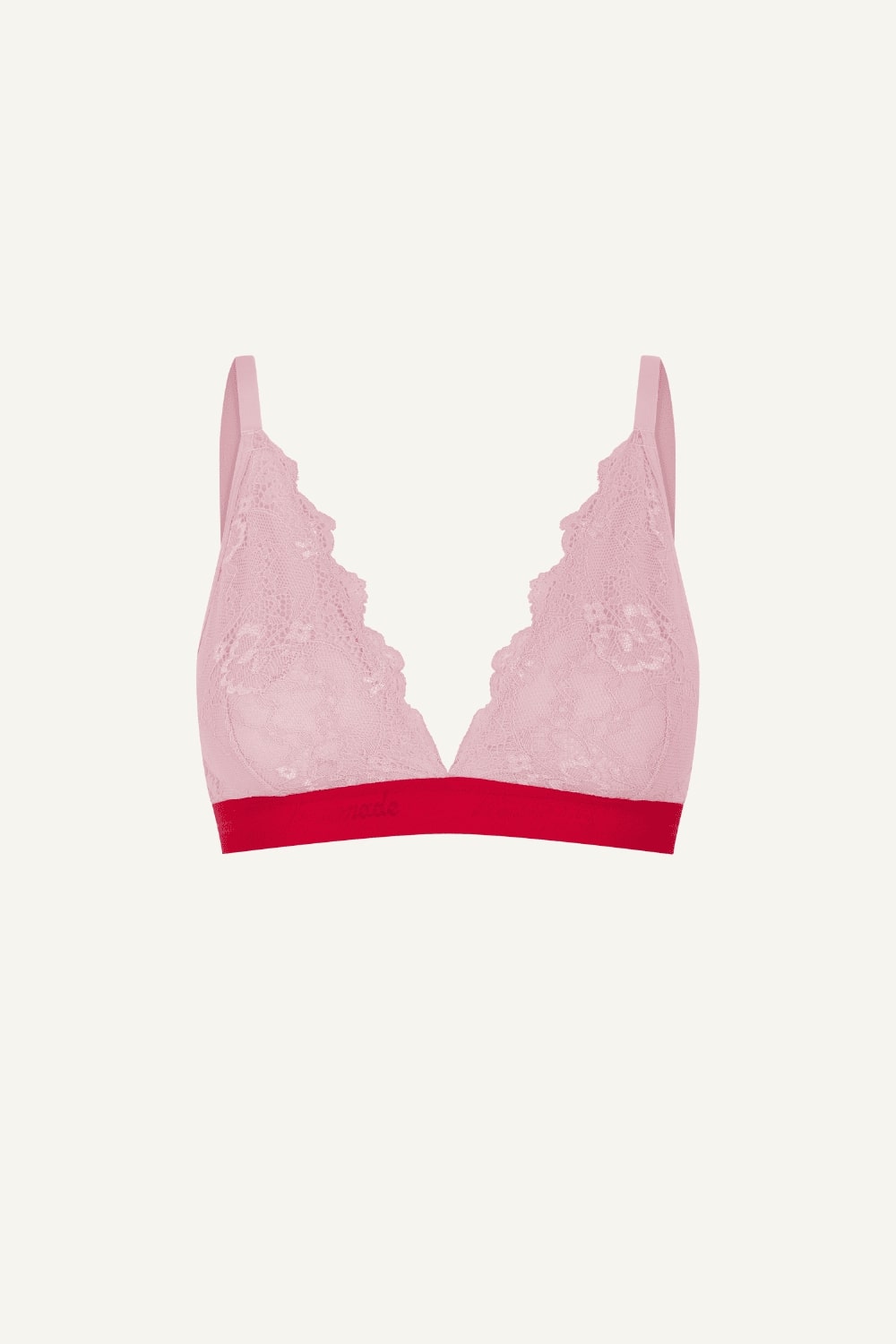 A ghost image of the front of a light pink bralette with a red band 