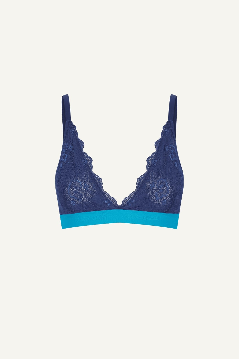 A ghost image of the front of a blue lace bralette 