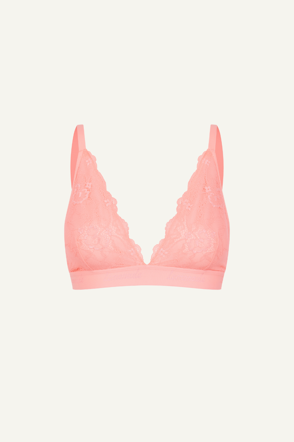 A ghost image of a coral lace bralette 
