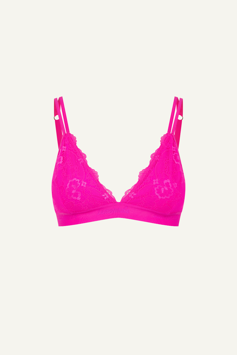 A ghost image of a neon pink lace bralette 