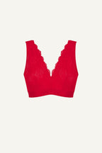 A ghost image of the front of a red lace fuller cup bralette 