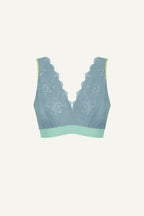 A ghost image of the front of a blue lace fuller cup bralette 