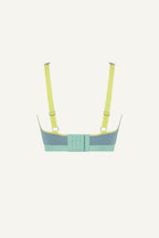 A ghost image of the back of a blue lace fuller cup bralette with yellow straps 