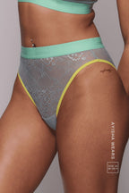 A woman wearing a highwaisted brazilian knicker 
